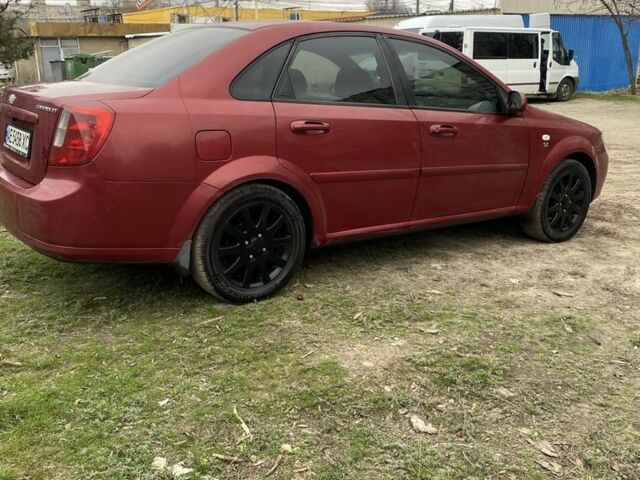 Красный Шевроле Лачетти, объемом двигателя 1.8 л и пробегом 267 тыс. км за 3999 $, фото 4 на Automoto.ua