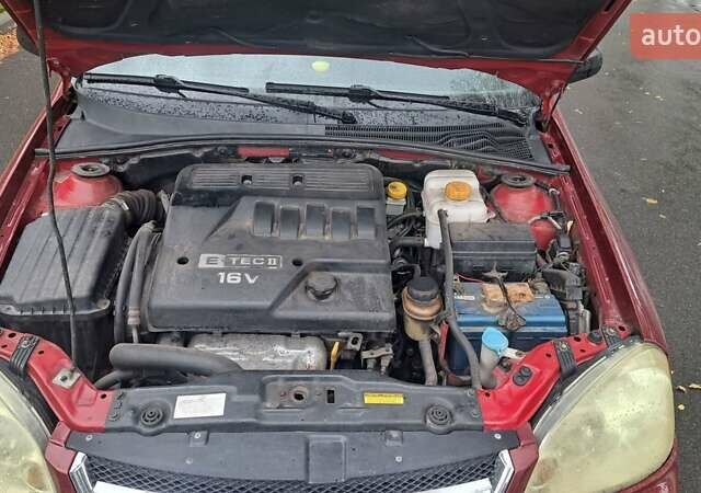 Красный Шевроле Лачетти, объемом двигателя 1.6 л и пробегом 275 тыс. км за 4500 $, фото 16 на Automoto.ua