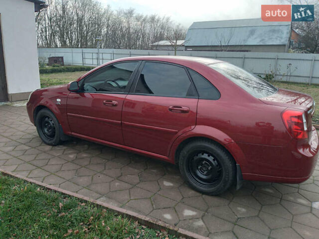Красный Шевроле Лачетти, объемом двигателя 1.8 л и пробегом 205 тыс. км за 5600 $, фото 2 на Automoto.ua