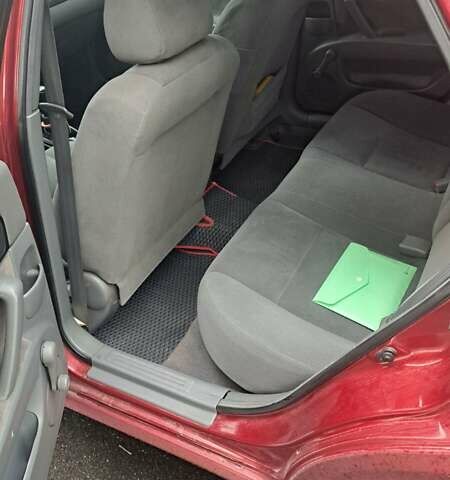 Красный Шевроле Лачетти, объемом двигателя 1.6 л и пробегом 275 тыс. км за 4500 $, фото 5 на Automoto.ua