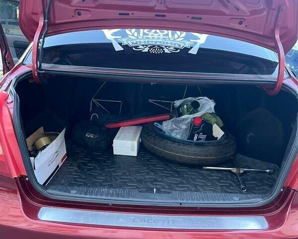 Красный Шевроле Лачетти, объемом двигателя 1.6 л и пробегом 149 тыс. км за 4550 $, фото 5 на Automoto.ua