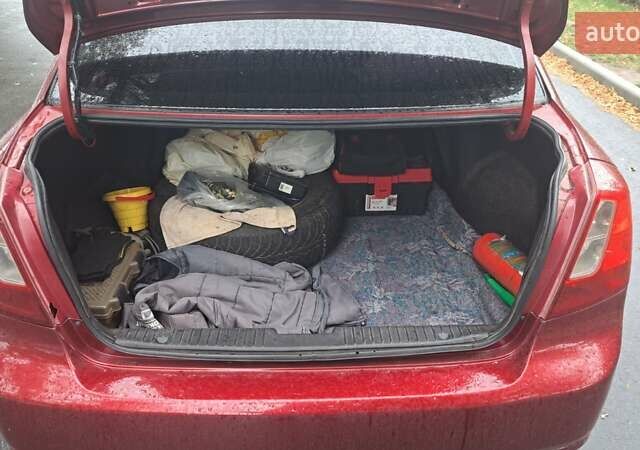 Красный Шевроле Лачетти, объемом двигателя 1.6 л и пробегом 275 тыс. км за 4500 $, фото 17 на Automoto.ua