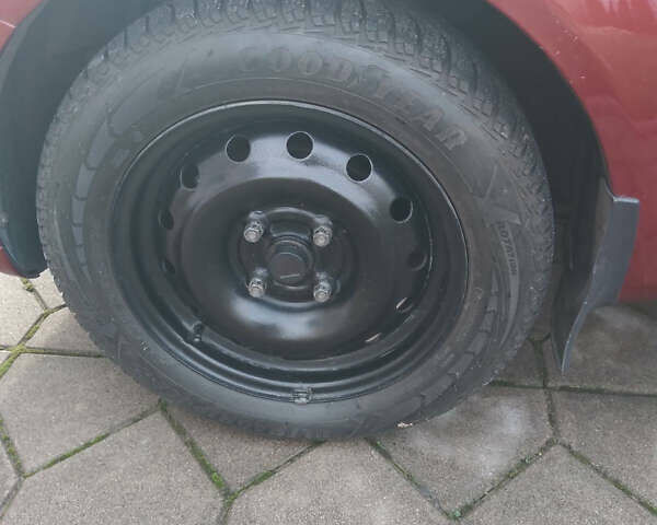 Красный Шевроле Лачетти, объемом двигателя 1.8 л и пробегом 205 тыс. км за 5600 $, фото 10 на Automoto.ua