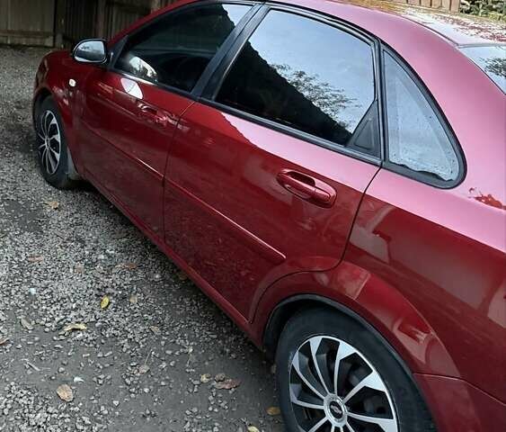 Красный Шевроле Лачетти, объемом двигателя 1.6 л и пробегом 368 тыс. км за 3300 $, фото 7 на Automoto.ua