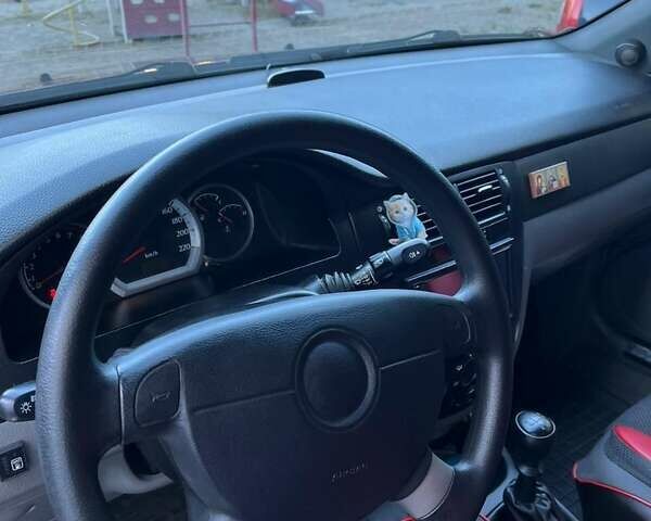 Красный Шевроле Лачетти, объемом двигателя 1.6 л и пробегом 149 тыс. км за 4550 $, фото 2 на Automoto.ua