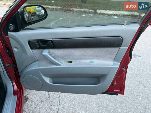 Червоний Шевроле Лачетті, об'ємом двигуна 1.6 л та пробігом 243 тис. км за 3950 $, фото 26 на Automoto.ua
