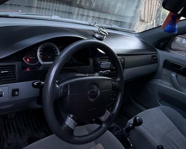 Красный Шевроле Лачетти, объемом двигателя 1.6 л и пробегом 368 тыс. км за 3300 $, фото 1 на Automoto.ua