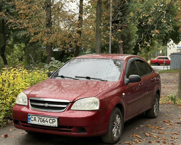 Красный Шевроле Лачетти, объемом двигателя 1.6 л и пробегом 213 тыс. км за 4500 $, фото 2 на Automoto.ua