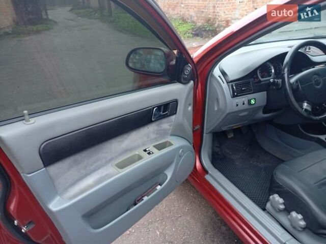 Красный Шевроле Лачетти, объемом двигателя 1.8 л и пробегом 290 тыс. км за 4100 $, фото 14 на Automoto.ua