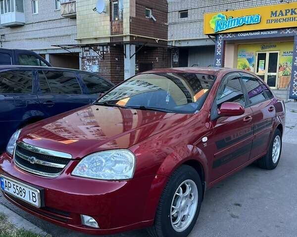 Красный Шевроле Лачетти, объемом двигателя 1.6 л и пробегом 149 тыс. км за 4550 $, фото 7 на Automoto.ua