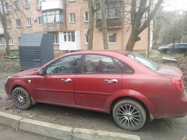 Красный Шевроле Лачетти, объемом двигателя 1.8 л и пробегом 140 тыс. км за 3250 $, фото 2 на Automoto.ua