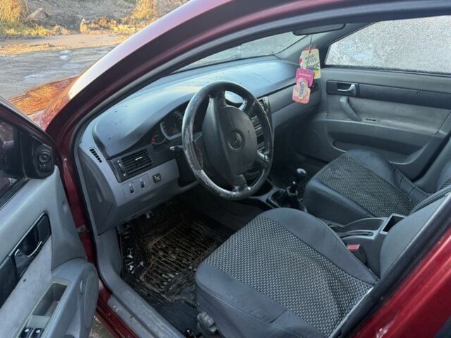 Червоний Шевроле Лачетті, об'ємом двигуна 1.8 л та пробігом 300 тис. км за 1550 $, фото 6 на Automoto.ua