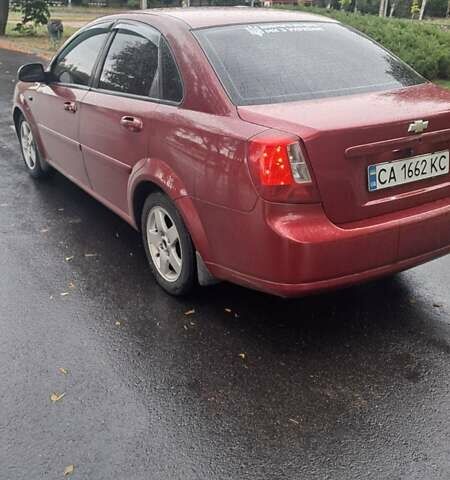 Красный Шевроле Лачетти, объемом двигателя 1.6 л и пробегом 275 тыс. км за 4500 $, фото 9 на Automoto.ua