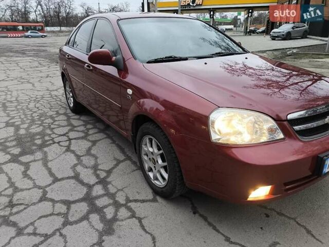 Красный Шевроле Лачетти, объемом двигателя 1.8 л и пробегом 139 тыс. км за 5300 $, фото 13 на Automoto.ua