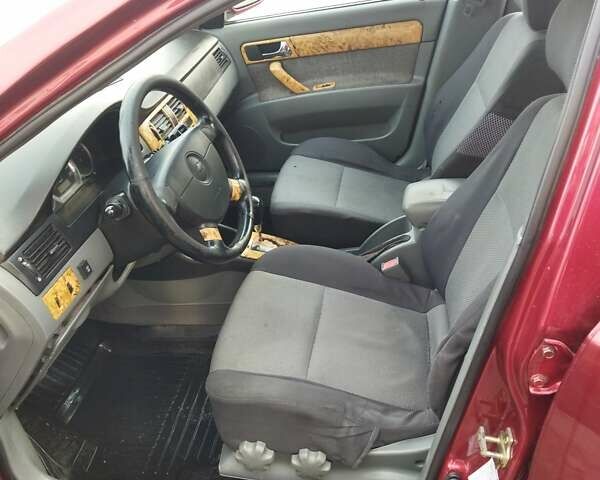 Червоний Шевроле Лачетті, об'ємом двигуна 1.8 л та пробігом 313 тис. км за 4500 $, фото 7 на Automoto.ua