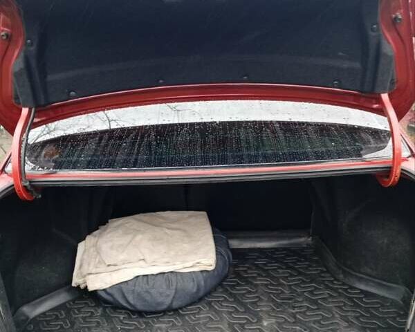 Красный Шевроле Лачетти, объемом двигателя 1.8 л и пробегом 290 тыс. км за 4100 $, фото 24 на Automoto.ua