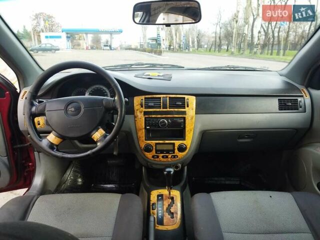 Червоний Шевроле Лачетті, об'ємом двигуна 1.8 л та пробігом 313 тис. км за 4500 $, фото 6 на Automoto.ua
