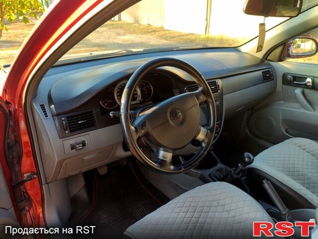 Червоний Шевроле Лачетті, об'ємом двигуна 1.8 л та пробігом 189 тис. км за 3800 $, фото 6 на Automoto.ua