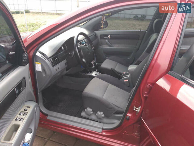 Красный Шевроле Лачетти, объемом двигателя 1.8 л и пробегом 205 тыс. км за 5600 $, фото 4 на Automoto.ua