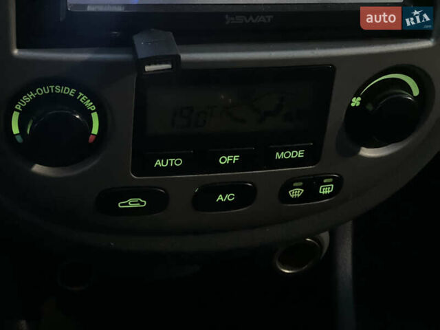 Червоний Шевроле Лачетті, об'ємом двигуна 1.8 л та пробігом 190 тис. км за 3750 $, фото 14 на Automoto.ua