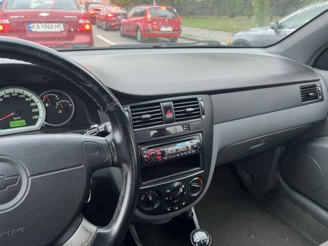 Червоний Шевроле Лачетті, об'ємом двигуна 1.8 л та пробігом 194 тис. км за 4200 $, фото 3 на Automoto.ua