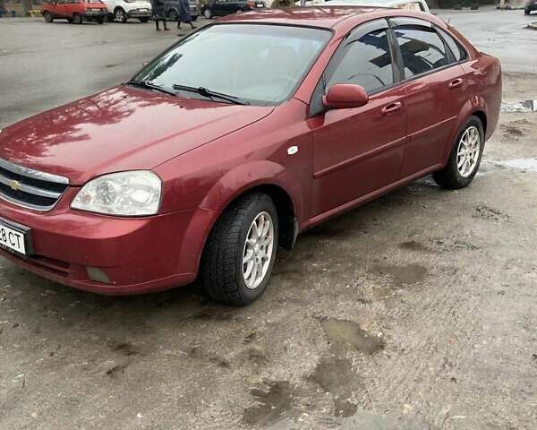 Красный Шевроле Лачетти, объемом двигателя 1.8 л и пробегом 230 тыс. км за 3700 $, фото 2 на Automoto.ua