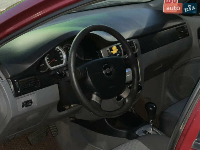 Червоний Шевроле Лачетті, об'ємом двигуна 1.8 л та пробігом 190 тис. км за 3750 $, фото 10 на Automoto.ua