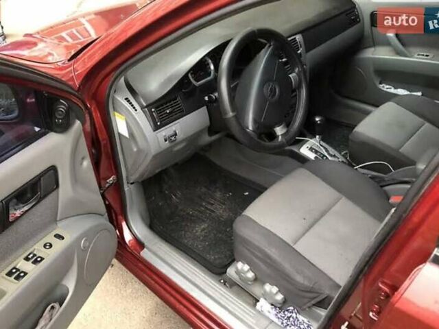 Красный Шевроле Лачетти, объемом двигателя 1.8 л и пробегом 230 тыс. км за 3700 $, фото 5 на Automoto.ua