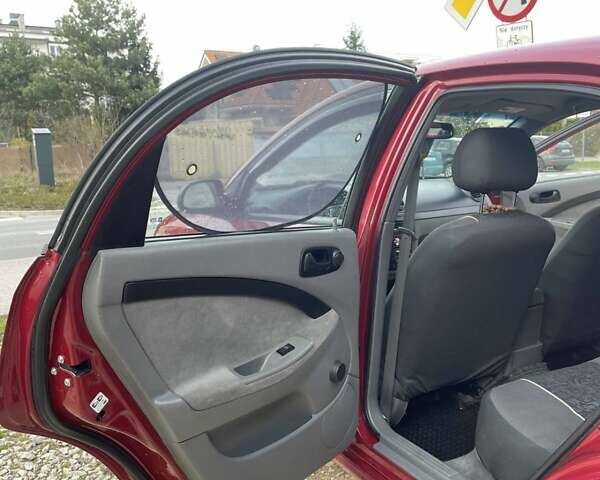 Красный Шевроле Лачетти, объемом двигателя 1.6 л и пробегом 130 тыс. км за 6200 $, фото 19 на Automoto.ua