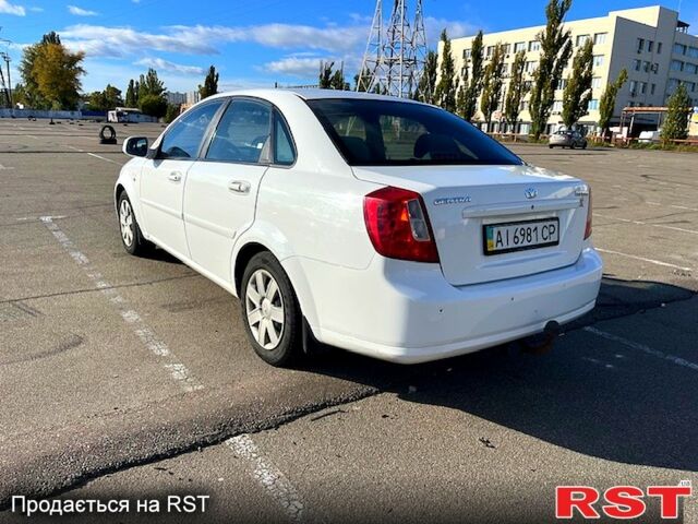 Червоний Шевроле Лачетті, об'ємом двигуна 1.8 л та пробігом 202 тис. км за 3899 $, фото 6 на Automoto.ua