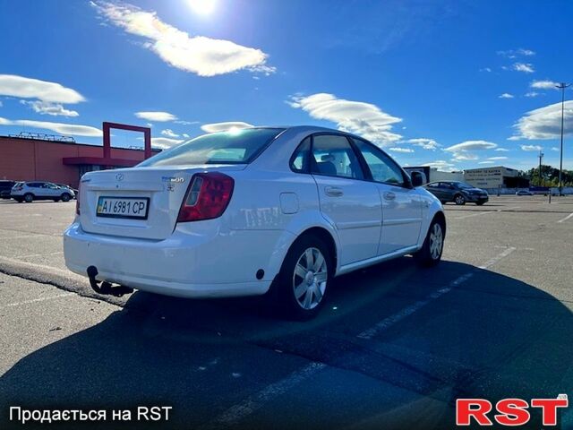 Червоний Шевроле Лачетті, об'ємом двигуна 1.8 л та пробігом 202 тис. км за 3899 $, фото 4 на Automoto.ua