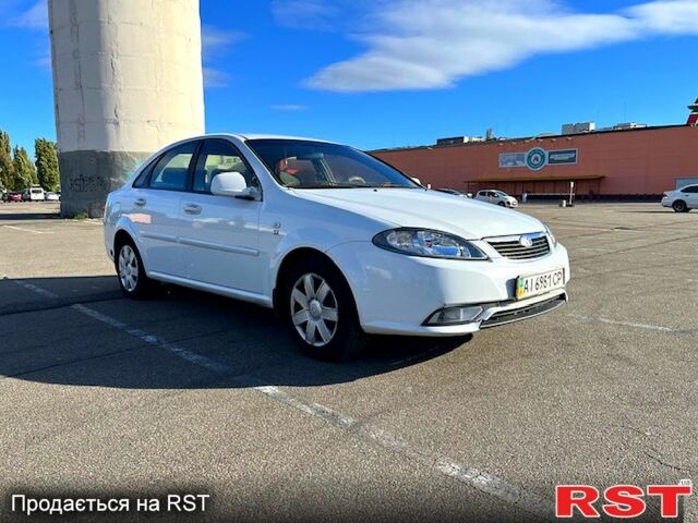 Червоний Шевроле Лачетті, об'ємом двигуна 1.8 л та пробігом 202 тис. км за 3899 $, фото 2 на Automoto.ua