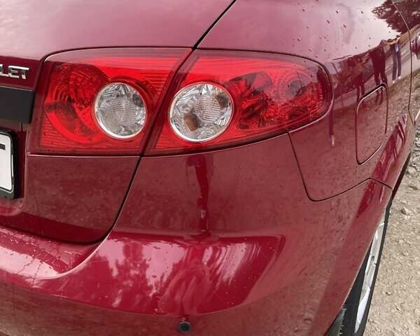 Красный Шевроле Лачетти, объемом двигателя 1.6 л и пробегом 130 тыс. км за 6200 $, фото 10 на Automoto.ua