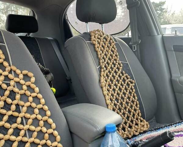 Красный Шевроле Лачетти, объемом двигателя 1.6 л и пробегом 130 тыс. км за 6200 $, фото 2 на Automoto.ua