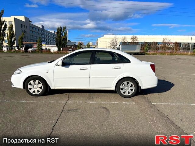 Червоний Шевроле Лачетті, об'ємом двигуна 1.8 л та пробігом 202 тис. км за 3899 $, фото 7 на Automoto.ua