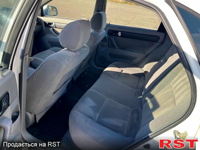 Червоний Шевроле Лачетті, об'ємом двигуна 1.8 л та пробігом 202 тис. км за 3899 $, фото 9 на Automoto.ua