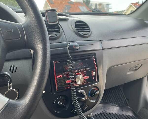 Красный Шевроле Лачетти, объемом двигателя 1.6 л и пробегом 130 тыс. км за 6200 $, фото 15 на Automoto.ua