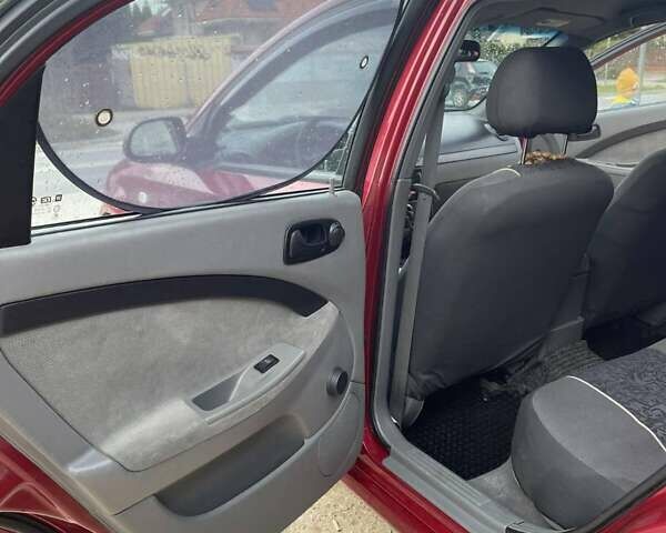 Красный Шевроле Лачетти, объемом двигателя 1.6 л и пробегом 130 тыс. км за 6200 $, фото 20 на Automoto.ua