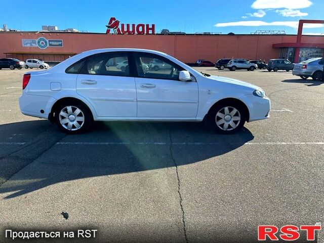 Червоний Шевроле Лачетті, об'ємом двигуна 1.8 л та пробігом 202 тис. км за 3899 $, фото 3 на Automoto.ua