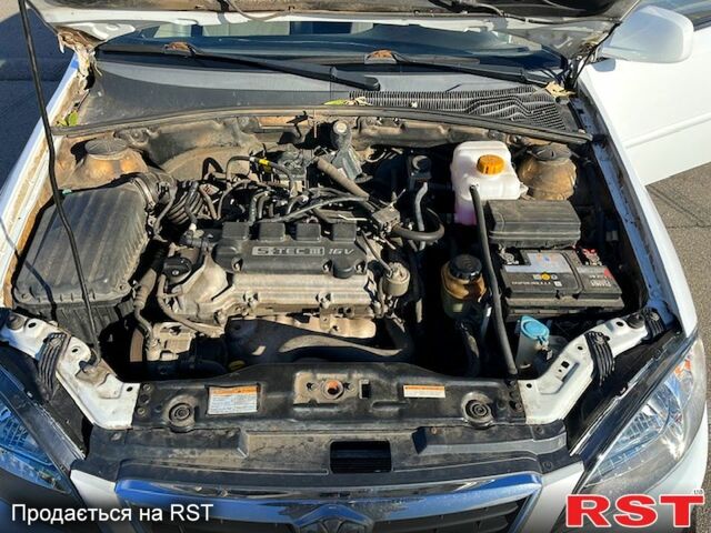 Червоний Шевроле Лачетті, об'ємом двигуна 1.8 л та пробігом 202 тис. км за 3899 $, фото 13 на Automoto.ua