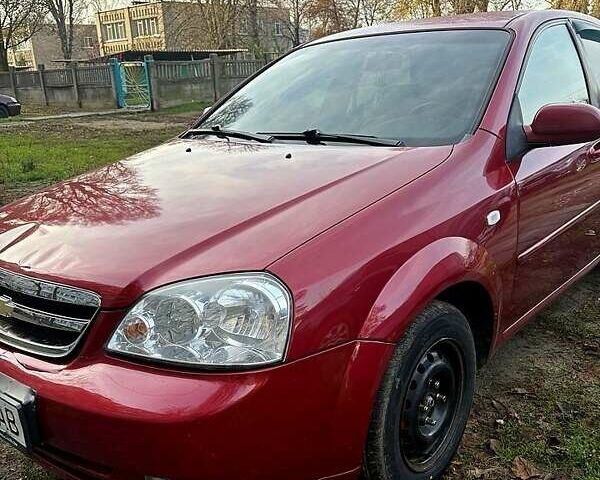 Красный Шевроле Лачетти, объемом двигателя 1.6 л и пробегом 153 тыс. км за 3500 $, фото 1 на Automoto.ua