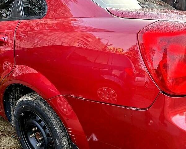 Красный Шевроле Лачетти, объемом двигателя 1.6 л и пробегом 153 тыс. км за 3500 $, фото 2 на Automoto.ua