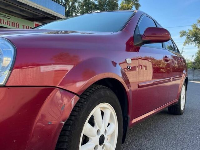 Красный Шевроле Лачетти, объемом двигателя 1.8 л и пробегом 171 тыс. км за 4400 $, фото 16 на Automoto.ua