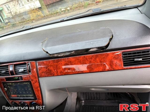 Красный Шевроле Лачетти, объемом двигателя 1.6 л и пробегом 153 тыс. км за 3500 $, фото 11 на Automoto.ua