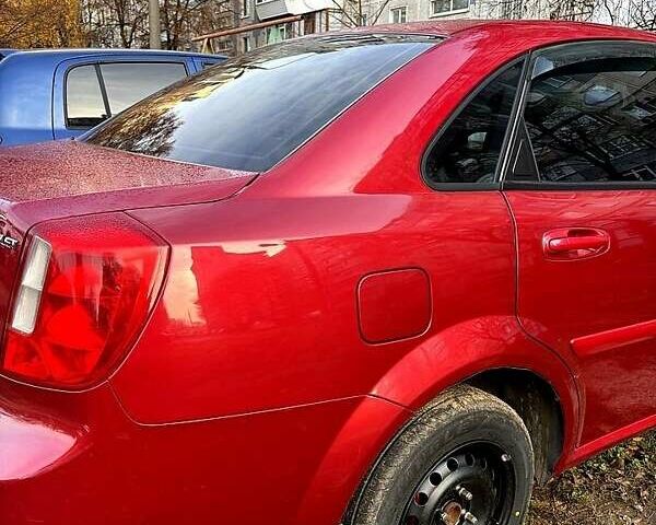 Красный Шевроле Лачетти, объемом двигателя 1.6 л и пробегом 153 тыс. км за 3500 $, фото 4 на Automoto.ua