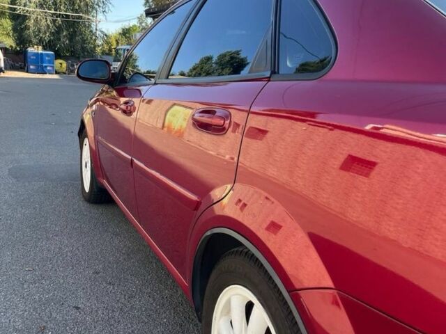 Красный Шевроле Лачетти, объемом двигателя 1.8 л и пробегом 171 тыс. км за 4400 $, фото 2 на Automoto.ua