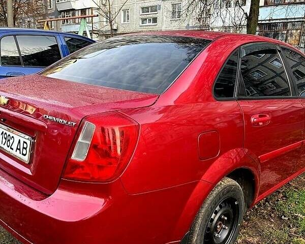 Красный Шевроле Лачетти, объемом двигателя 1.6 л и пробегом 153 тыс. км за 3500 $, фото 5 на Automoto.ua