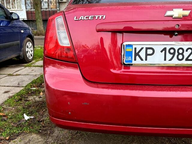 Красный Шевроле Лачетти, объемом двигателя 1.6 л и пробегом 153 тыс. км за 3500 $, фото 4 на Automoto.ua
