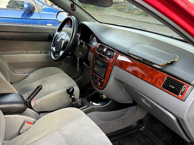 Червоний Шевроле Лачетті, об'ємом двигуна 1.6 л та пробігом 153 тис. км за 3500 $, фото 11 на Automoto.ua