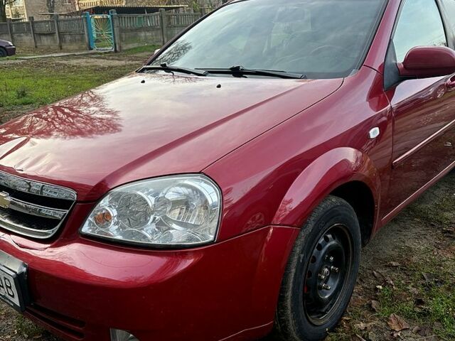 Красный Шевроле Лачетти, объемом двигателя 1.6 л и пробегом 153 тыс. км за 3500 $, фото 2 на Automoto.ua